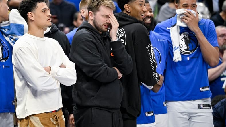 Apr 7, 2023; Dallas, Texas, USA; Dallas Mavericks guard Josh Green (8) and guard Luka Doncic (77) and forward Christian Wood (35) and forward Markieff Morris (13) and center JaVale McGee (00) watch the game between the Dallas Mavericks and the Chicago Bulls during the second half at the American Airlines Center. Mandatory Credit: Jerome Miron-USA TODAY Sports