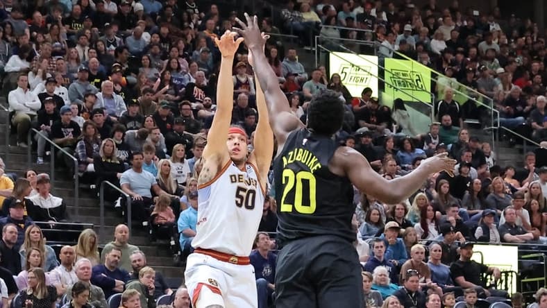 Apr 8, 2023; Salt Lake City, Utah, USA; Denver Nuggets forward Aaron Gordon (50) shoots over Utah Jazz center Udoka Azubuike (20) in the second quarter at Vivint Arena. Mandatory Credit: Rob Gray-USA TODAY Sports