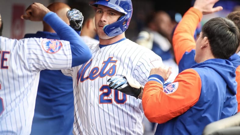 Apr 8, 2023; New York City, New York, USA;  New York Mets first baseman Pete Alonso (20) celebrates with his teammates after hitting a two run home run in the fifth inning against the Miami Marlins at Citi Field. Mandatory Credit: Wendell Cruz-USA TODAY Sports
