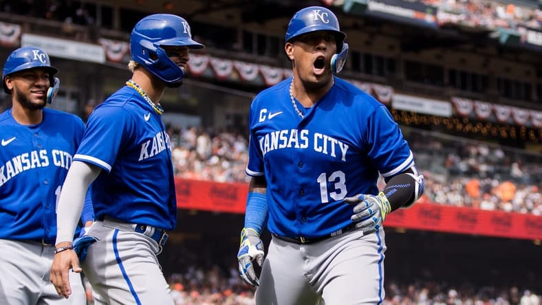 Apr 8, 2023; San Francisco, California, USA;  Kansas City Royals catcher Salvador Perez (13) is congratulated by right fielder MJ Melendez (1) after hitting a three-run home run against the San Francisco Giants during the eighth inning at Oracle Park. Mandatory Credit: John Hefti-USA TODAY Sports