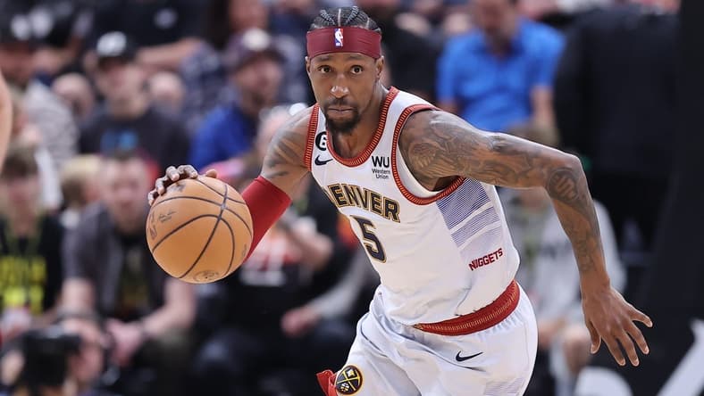 Apr 8, 2023; Salt Lake City, Utah, USA; Denver Nuggets guard Kentavious Caldwell-Pope (5) brings the ball up the court against the Utah Jazz in the first half at Vivint Arena. Mandatory Credit: Rob Gray-USA TODAY Sports