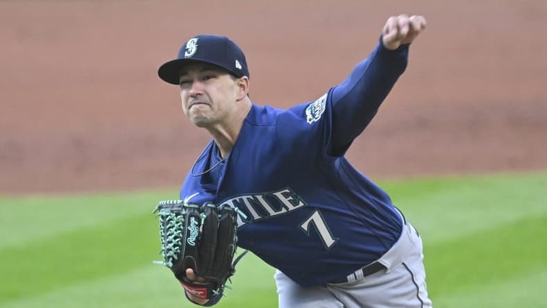 Apr 8, 2023; Cleveland, Ohio, USA; Seattle Mariners starting pitcher Marco Gonzales (7) delivers a pitch in the first inning against the Cleveland Guardians at Progressive Field. Mandatory Credit: David Richard-USA TODAY Sports