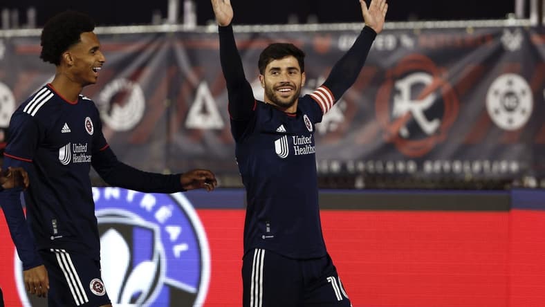 Apr 8, 2023; Foxborough, Massachusetts, USA; New England Revolution midfielder Carles Gil (10) celebrates his penalty kick goal against CF Montr  al with New England Revolution midfielder Dylan Borrero (11) during the first half at Gillette Stadium. Mandatory Credit: Winslow Townson-USA TODAY Sports