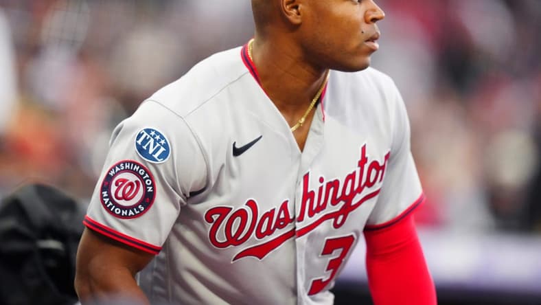 Apr 8, 2023; Denver, Colorado, USA; Washington Nationals left fielder Stone Garrett (36) heads on deck in the first inning against the Colorado Rockies at Coors Field. Mandatory Credit: Ron Chenoy-USA TODAY Sports