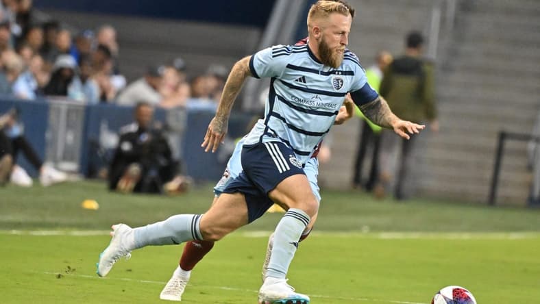 Apr 8, 2023; Kansas City, Kansas, USA; Sporting Kansas City forward Johnny Russell (7) in action during the first half at Children's Mercy Park. Mandatory Credit: Peter Aiken-USA TODAY Sports
