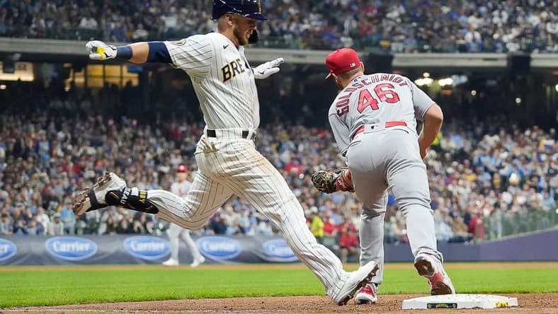 St. Louis Cardinals first baseman Paul Goldschmidt (46) beats a Milwaukee Brewers player to the base during the fifth inning of the game at American Family Field on Saturday April 8, 2023 in Milwaukee, Wis.