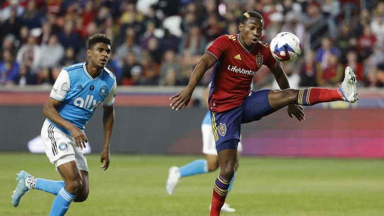 Apr 8, 2023; Sandy, Utah, USA; Real Salt Lake midfielder Anderson Julio (29) looks to control the ball against Charlotte FC defender Adilson Malanda (29) in the first half at America First Field. Mandatory Credit: Jeffrey Swinger-USA TODAY Sports