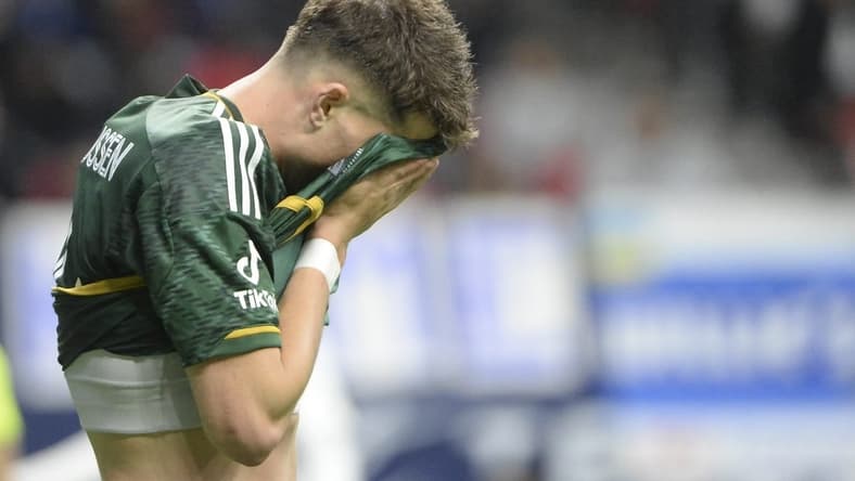 Apr 8, 2023; Vancouver, British Columbia, CAN;  Portland Timbers defender Justin Rasmussen (14) reacts during the second half against the Vancouver Whitecaps FC at BC Place. Mandatory Credit: Anne-Marie Sorvin-USA TODAY Sports