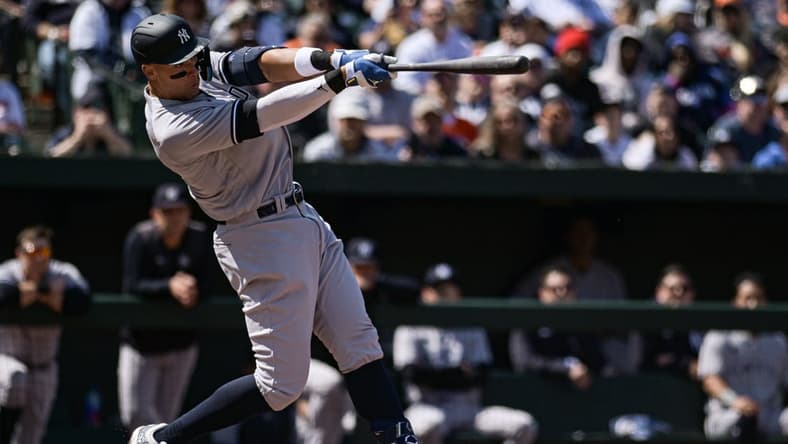 Apr 8, 2023; Baltimore, Maryland, USA;  New York Yankees right fielder Aaron Judge (99) hits a  a third inning solo home run against the Baltimore Orioles  at Oriole Park at Camden Yards. Mandatory Credit: Tommy Gilligan-USA TODAY Sports