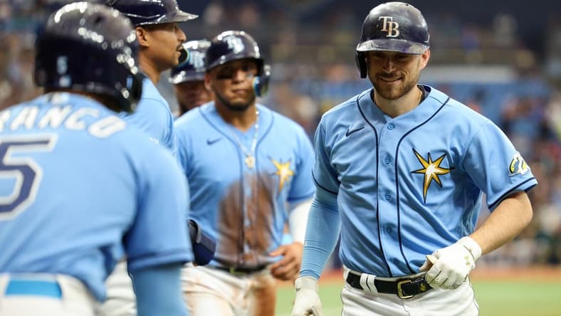 Apr 9, 2023; St. Petersburg, Florida, USA;  Tampa Bay Rays second baseman Brandon Lowe (8) celebrates after hitting a grand slam against the Oakland Athletics in the fourth inning at Tropicana Field. Mandatory Credit: Nathan Ray Seebeck-USA TODAY Sports
