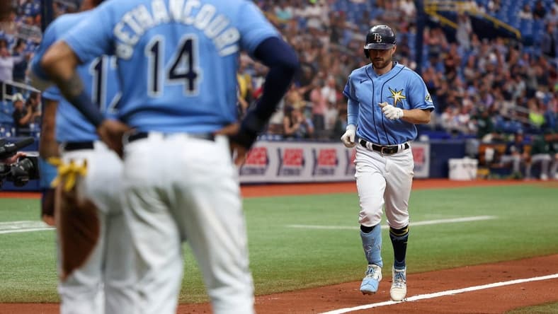 Apr 9, 2023; St. Petersburg, Florida, USA;  Tampa Bay Rays second baseman Brandon Lowe (8) runs the bases after hitting a grand slam against the Oakland Athletics in the fourth inning at Tropicana Field. Mandatory Credit: Nathan Ray Seebeck-USA TODAY Sports