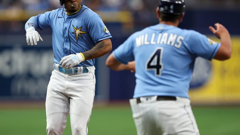 Apr 9, 2023; St. Petersburg, Florida, USA;  Tampa Bay Rays shortstop Wander Franco (5) celebrates after hitting a home run against the Oakland Athletics in the first inning at Tropicana Field. Mandatory Credit: Nathan Ray Seebeck-USA TODAY Sports