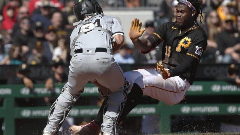 Apr 9, 2023; Pittsburgh, Pennsylvania, USA; Chicago White Sox catcher Seby Zavala (44) tags Pittsburgh Pirates shortstop Oneil Cruz (15) out at home plate attempting to score during the sixth inning at PNC Park. Cruz suffered an apparent injury on the play and left the game. Mandatory Credit: Charles LeClaire-USA TODAY Sports