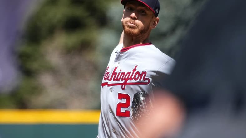 Apr 9, 2023; Denver, Colorado, USA; Washington Nationals starting pitcher Chad Kuhl (26) delivers a pitch in the first inning against the Colorado Rockies at Coors Field. Mandatory Credit: Ron Chenoy-USA TODAY Sports