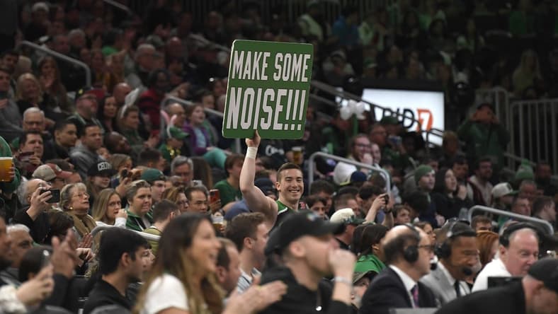 Apr 9, 2023; Boston, Massachusetts, USA; A fan holds a sign during the first half at TD Garden. Mandatory Credit: Bob DeChiara-USA TODAY Sports