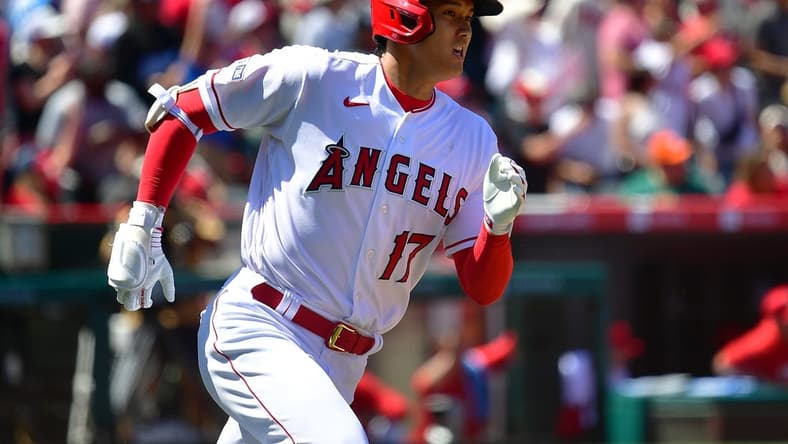 Apr 9, 2023; Anaheim, California, USA; Los Angeles Angels designated hitter Shohei Ohtani (17) runs after hitting a two run home run against the Toronto Blue Jays during the third inning  at Angel Stadium. Mandatory Credit: Gary A. Vasquez-USA TODAY Sports