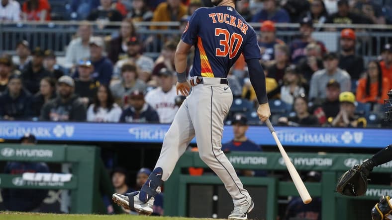 Apr 10, 2023; Pittsburgh, Pennsylvania, USA;  Houston Astros right fielder Kyle Tucker (30) hits a two run single against the Pittsburgh Pirates during the fourth inning at PNC Park. Mandatory Credit: Charles LeClaire-USA TODAY Sports