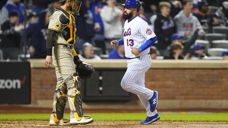 Apr 10, 2023; New York City, New York, USA; New York Mets second baseman Luis Guillorme (13) scores a run on New York Mets shortstop Francisco Lindor (12) (not pictured) RBI double against the San Diego Padres during the seventh inning at Citi Field. Mandatory Credit: Gregory Fisher-USA TODAY Sports