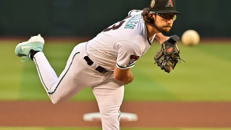 Apr 10, 2023; Phoenix, Arizona, USA; Arizona Diamondbacks starting pitcher Zac Gallen (23) throws in the first inning against the Milwaukee Brewers at Chase Field. Mandatory Credit: Matt Kartozian-USA TODAY Sports