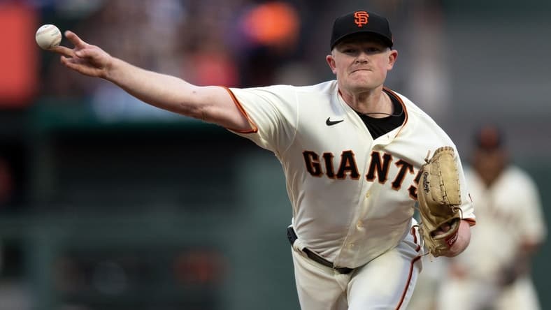Apr 10, 2023; San Francisco, California, USA; San Francisco Giants starting pitcher Logan Webb (62) delivers a pitch against the Los Angeles Dodgers during the first inning at Oracle Park. Mandatory Credit: D. Ross Cameron-USA TODAY Sports