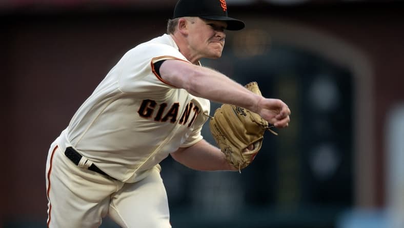 Apr 10, 2023; San Francisco, California, USA; San Francisco Giants starting pitcher Logan Webb (62) delivers a pitch against the Los Angeles Dodgers during the second inning at Oracle Park. Mandatory Credit: D. Ross Cameron-USA TODAY Sports