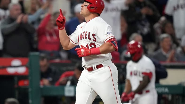 Apr 10, 2023; Anaheim, California, USA; Los Angeles Angels right fielder Hunter Renfroe (12) rounds the bases after hitting a solo home run in the third inning against the Washington Nationals at Angel Stadium. Mandatory Credit: Kirby Lee-USA TODAY Sports