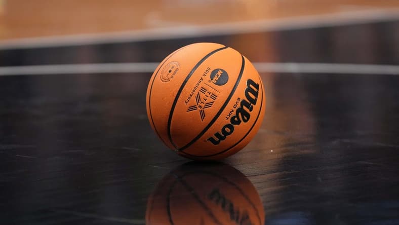 Apr 2, 2023; Dallas, TX, USA; A Wilson EVO NXT basketball with Title IX logo on the court during the NCAA Womens Basketball Final Four National Championship at American Airlines Center. Mandatory Credit: Kirby Lee-USA TODAY Sports
