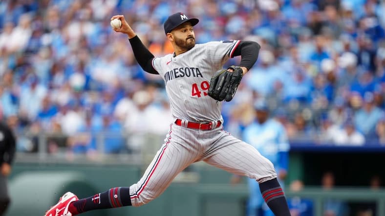Mar 30, 2023; Kansas City, Missouri, USA; Minnesota Twins starting pitcher Pablo Lopez (49) pitches during the first inning against the Kansas City Royals at Kauffman Stadium. Mandatory Credit: Jay Biggerstaff-USA TODAY Sports