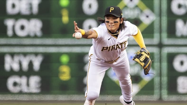 Apr 11, 2023; Pittsburgh, Pennsylvania, USA; Pittsburgh Pirates second baseman Ji Hwan Bae (3) tosses the ball to second base for the first out of the second inning against the Houston Astros at PNC Park. Mandatory Credit: Scott Galvin-USA TODAY Sports