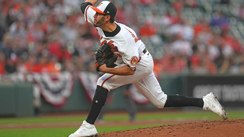 Apr 11, 2023; Baltimore, Maryland, USA; Baltimore Orioles pitcher Grayson Rodriguez (30) delivers in the second inning against the Oakland Athletics at Oriole Park at Camden Yards. Mandatory Credit: Mitch Stringer-USA TODAY Sports