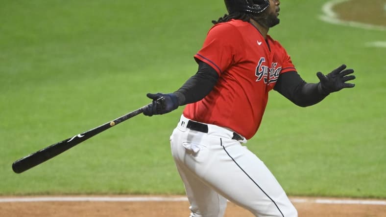 Apr 11, 2023; Cleveland, Ohio, USA; Cleveland Guardians designated hitter Josh Bell (55) doubles in the ninth inning against the New York Yankees at Progressive Field. Mandatory Credit: David Richard-USA TODAY Sports
