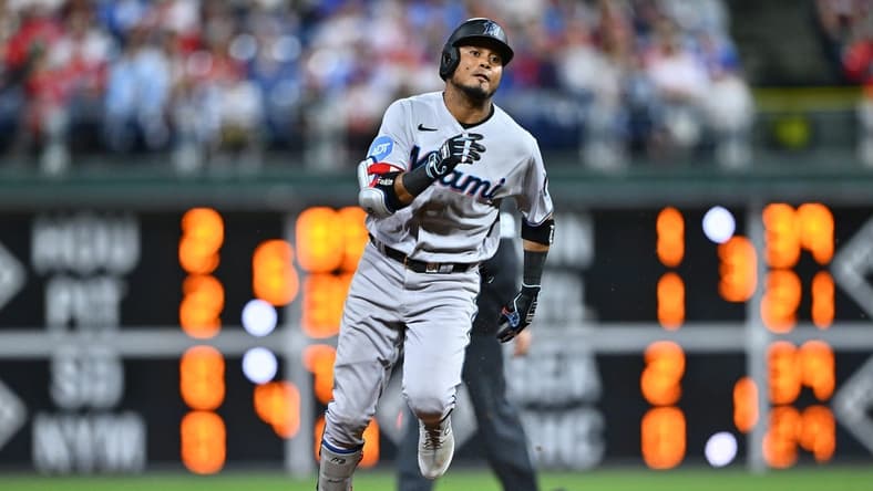 Apr 11, 2023; Philadelphia, Pennsylvania, USA; Miami Marlins second baseman Luis Arraez (3) advances to third after hitting a triple against the Philadelphia Phillies in the sixth inning at Citizens Bank Park. Mandatory Credit: Kyle Ross-USA TODAY Sports