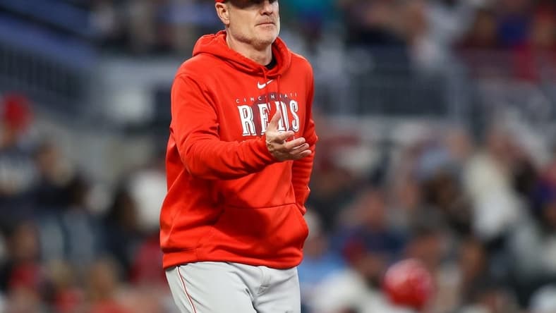 Apr 11, 2023; Atlanta, Georgia, USA; Cincinnati Reds manager David Bell (25) makes a pitching change against the Atlanta Braves in the fifth inning at Truist Park. Mandatory Credit: Brett Davis-USA TODAY Sports