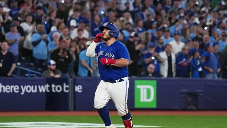 Apr 11, 2023; Toronto, Ontario, CAN; Toronto Blue Jays catcher Alejandro Kirk (30) celebrates after hitting a three-run home run against the Detroit Tigers during the eighth inning at the Rogers Centre. Mandatory Credit: Nick Turchiaro-USA TODAY Sports