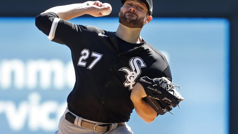 Apr 12, 2023; Minneapolis, Minnesota, USA; Chicago White Sox starting pitcher Lucas Giolito (27) throws to the Minnesota Twins in the first inning at Target Field. Mandatory Credit: Bruce Kluckhohn-USA TODAY Sports