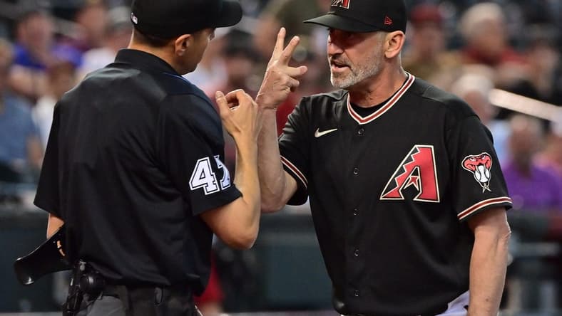 Apr 12, 2023; Phoenix, Arizona, USA;  Arizona Diamondbacks manager Torey Lovullo (17) argues with umpire Gabe Morales (47) after being ejected in the third inning against the Milwaukee Brewers at Chase Field. Mandatory Credit: Matt Kartozian-USA TODAY Sports