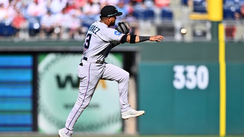Apr 12, 2023; Philadelphia, Pennsylvania, USA; Miami Marlins second baseman Luis Arraez (3) throws to first against the Philadelphia Phillies in the second inning at Citizens Bank Park. Mandatory Credit: Kyle Ross-USA TODAY Sports