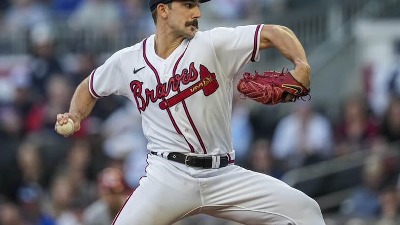 Apr 12, 2023; Cumberland, Georgia, USA; Atlanta Braves starting pitcher Spencer Strider (99) pitches against the Cincinnati Reds during the first inning at Truist Park. Mandatory Credit: Dale Zanine-USA TODAY Sports