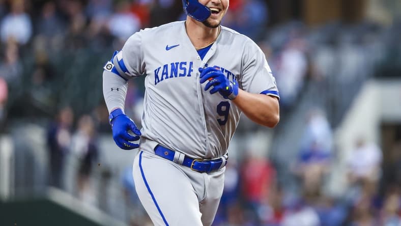 Apr 12, 2023; Arlington, Texas, USA;  Kansas City Royals first baseman Vinnie Pasquantino (9) reacts after hitting a home run during the third inning against the Texas Rangers  at Globe Life Field. Mandatory Credit: Kevin Jairaj-USA TODAY Sports
