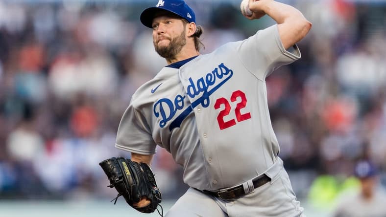Apr 12, 2023; San Francisco, California, USA;  Los Angeles Dodgers starting pitcher Clayton Kershaw (22) throws against the San Francisco Giants during the first inning at Oracle Park. Mandatory Credit: John Hefti-USA TODAY Sports