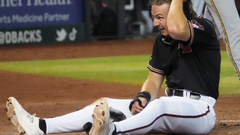 Arizona Diamondbacks' Jake McCarthy (31) reacts to being called out at home plate against the Milwaukee Brewers at Chase Field in Phoenix on April 12, 2023.

Mlb Brewers At D Backs