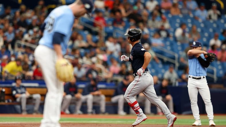 Apr 13, 2023; St. Petersburg, Florida, USA;  Boston Red Sox left fielder Rob Refsnyder (30) runs the bases after hitting a home run off of Tampa Bay Rays starting pitcher Jeffrey Springs (59) in the first inning at Tropicana Field. Mandatory Credit: Nathan Ray Seebeck-USA TODAY Sports