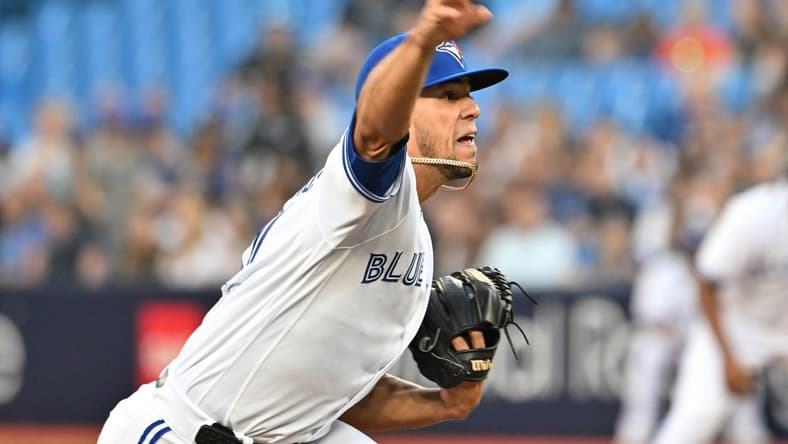 Apr 14, 2023; Toronto, Ontario, CAN;    Toronto Blue Jays starting pitcher Jose Berrios (17) delivers a pitch against the Tampa Bay Rays in the first inning at Rogers Centre. Mandatory Credit: Dan Hamilton-USA TODAY Sports