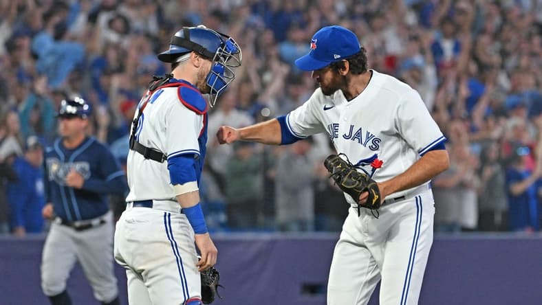 Apr 14, 2023; Toronto, Ontario, CAN;    Toronto Blue Jays relief pitcher Jordan Romano (68) celebrates with catcher Danny Jansen (9) after a 6-3 win over the Tampa Bay Rays at Rogers Centre. Mandatory Credit: Dan Hamilton-USA TODAY Sports