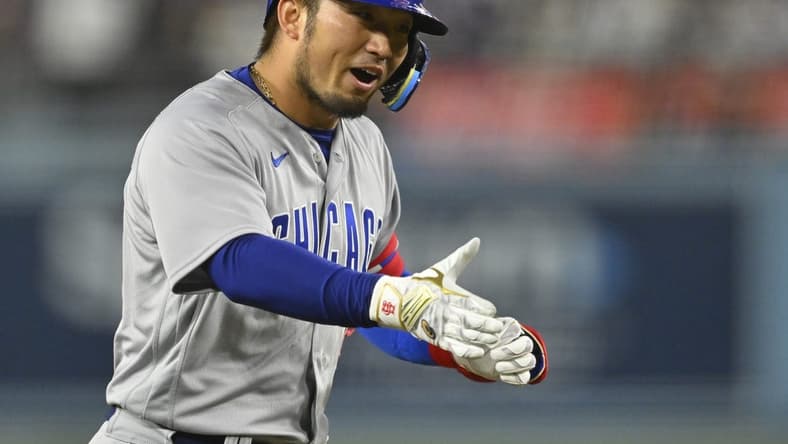 Apr 14, 2023; Los Angeles, California, USA;  Chicago Cubs right fielder Seiya Suzuki (27) rounds the bases after hitting a solo home run in the ninth inning against the Los Angeles Dodgers at Dodger Stadium. Mandatory Credit: Jayne Kamin-Oncea-USA TODAY Sports