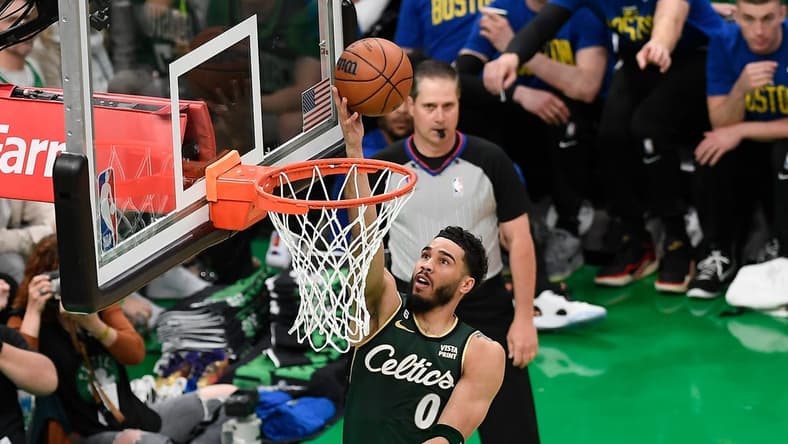 Apr 15, 2023; Boston, Massachusetts, USA; Boston Celtics forward Jayson Tatum (0) shoots a layup against the Atlanta Hawks during the first quarter of game one of the 2023 NBA playoffs at TD Garden. Mandatory Credit: Eric Canha-USA TODAY Sports