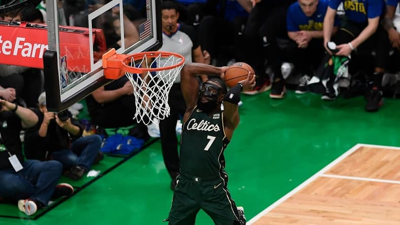 Apr 15, 2023; Boston, Massachusetts, USA; Boston Celtics guard Jaylen Brown (7) dunks against the Atlanta Hawks during the second quarter of game one of the 2023 NBA playoffs at TD Garden. Mandatory Credit: Eric Canha-USA TODAY Sports