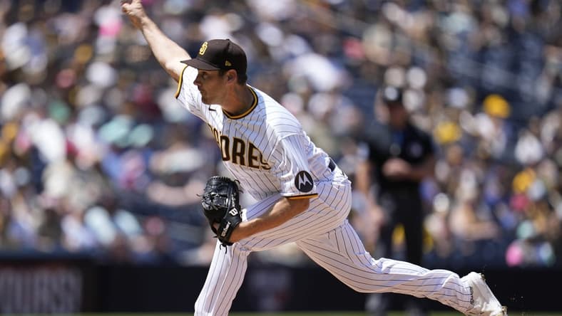 Apr 15, 2023; San Diego, California, USA;  San Diego Padres starting pitcher Seth Lugo (67) throws a pitch against the Milwaukee Brewers during the first inning at Petco Park. Mandatory Credit: Ray Acevedo-USA TODAY Sports
