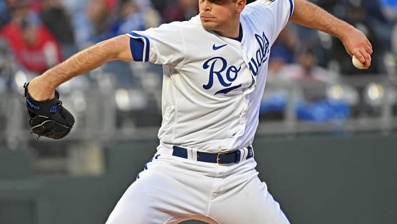 Apr 15, 2023; Kansas City, Missouri, USA;  Kansas City Royals starting pitcher Kris Bubic (50) delivers a pitch during the first inning against the Atlanta Braves at Kauffman Stadium. Mandatory Credit: Peter Aiken-USA TODAY Sports