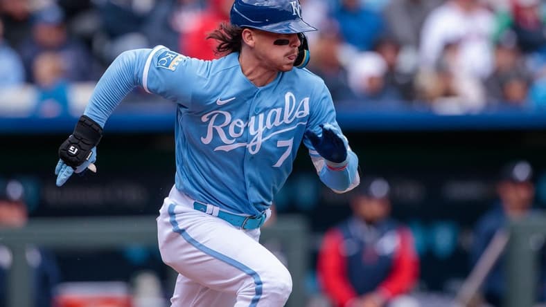 Apr 16, 2023; Kansas City, Missouri, USA; Kansas City Royals shortstop Bobby Witt Jr. (7) heads to first base after a hit during the fourth inning against the Atlanta Braves at Kauffman Stadium. Mandatory Credit: William Purnell-USA TODAY Sports